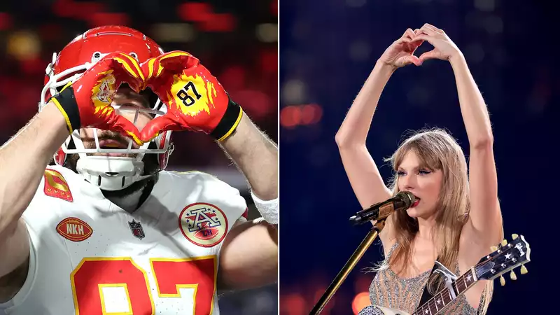 Travis Kells celebrates a touchdown with a gesture signed by Taylor Swift.